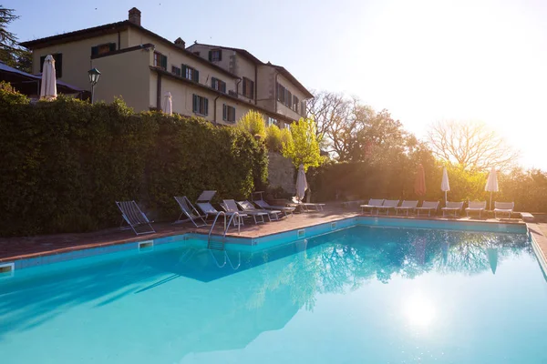 Swimming pool at sunrise — Stock Photo, Image