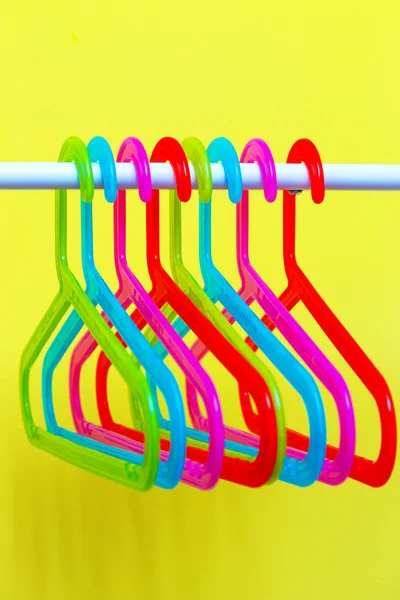 Multicolored hangers on white background — Stock Photo, Image