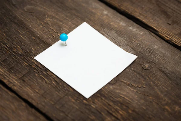 Blank sheet for notes on wooden background — Stock Photo, Image