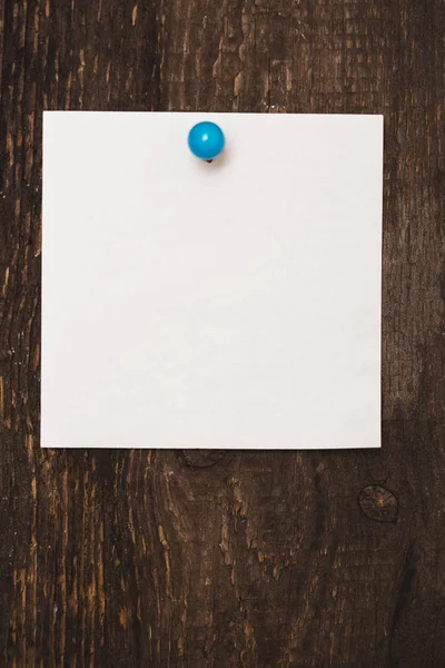 Blank sheet for notes on wooden background — Stock Photo, Image