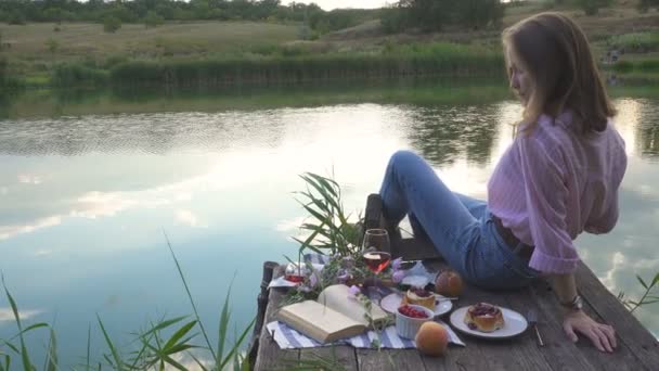 Girl Enjoying Picnic Wooden Pier Shiny Summer River Shore — Stock Video