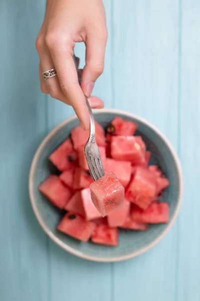 Watermelon Plate Blue Background Hand Holds Fork Slice Watermelo — Stock Photo, Image