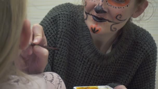 Mother Daughter Preparing Halloween Celebration Making Painted Scary Face Make — Stock Video