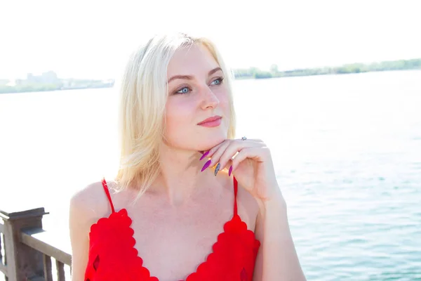 Girl Red Dress Standing Embankment River — Stock Photo, Image