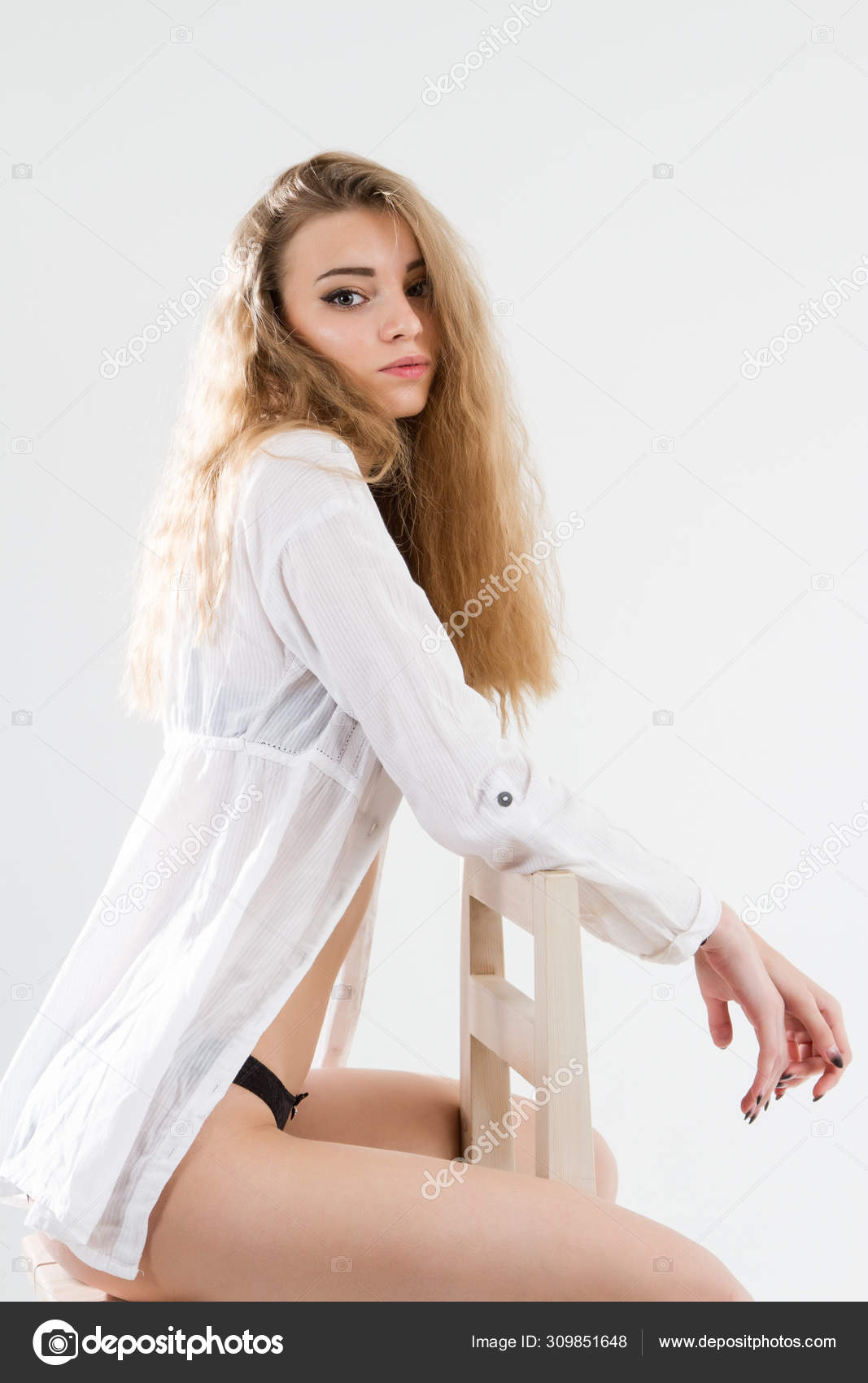 https://st4.depositphotos.com/1003646/30985/i/1600/depositphotos_309851648-stock-photo-young-girl-posing-white-men.jpg