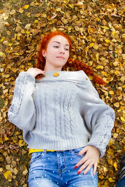 Young Red Haired Girl Lies Yellow Autumn Foliage — Stock Photo, Image