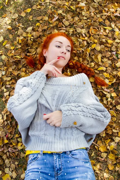 Young Red Haired Girl Lies Yellow Autumn Foliage — Stock Photo, Image