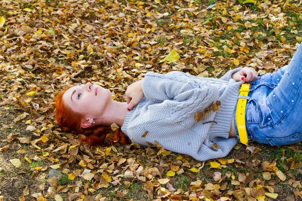 Young Red Haired Girl Lies Yellow Autumn Foliage — Stock Photo, Image