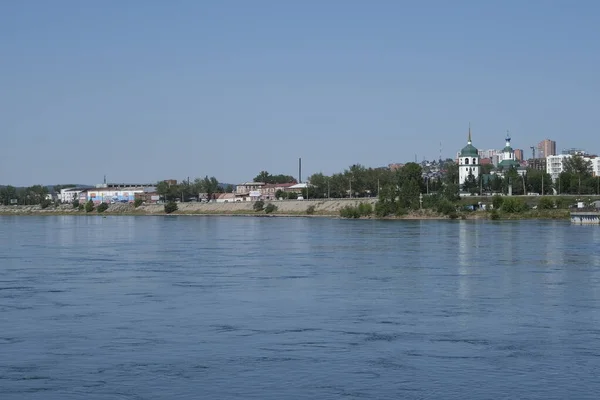 bed of the Angara river. View from the Embankment. Summer