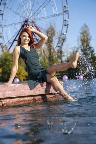 Girl Splashing Feet Water Sitting Pier — Stock Photo, Image