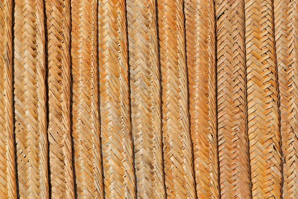 アフリカの伝統的な織物の葦の壁の背景 — ストック写真