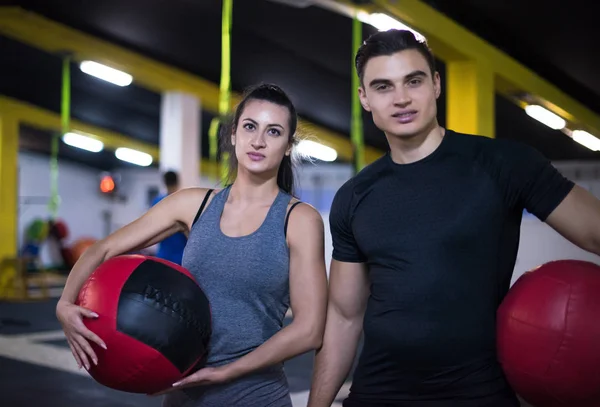 Young Athletes Couple Working Out Medical Ball Cross Fitness Gym — Stock Photo, Image