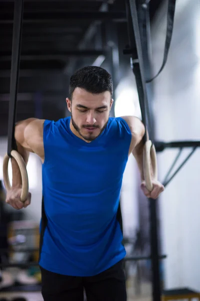 Young Athlete Man Working Out Pull Ups Gymnastic Rings Cross — Stock Photo, Image
