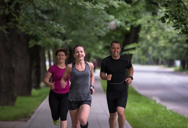 Groep Gezonde Mensen Joggen Het Stadspark Hardlopers Team Ochtend Training — Stockfoto