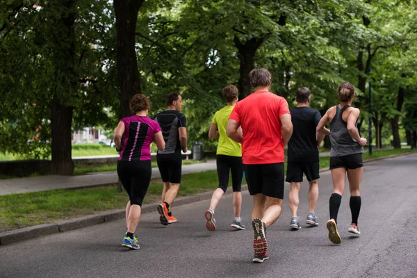 Gruppe Gesunder Joggt Stadtpark Läuferteam Beim Morgentraining — Stockfoto