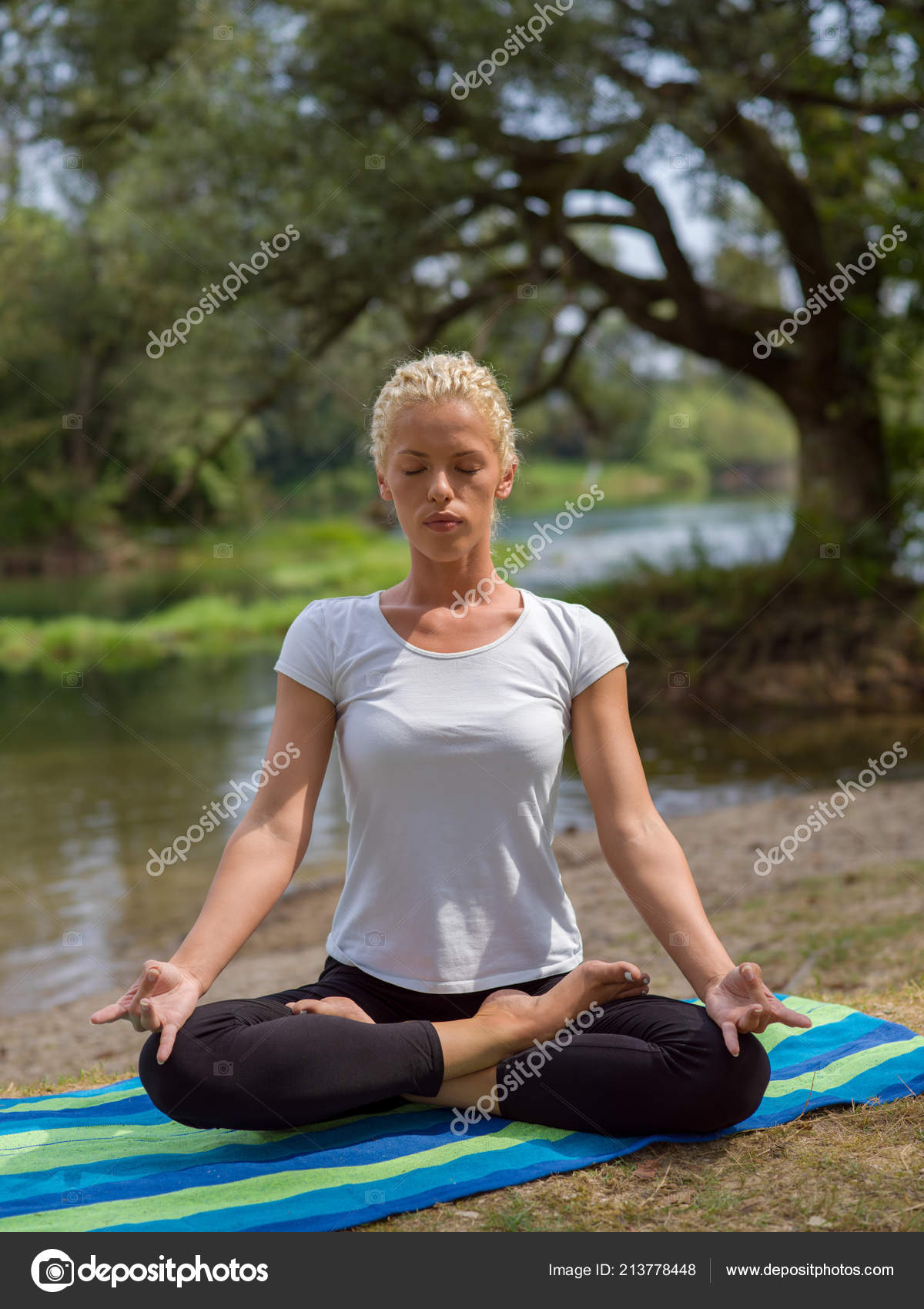 Healthy Woman Relaxing While Meditating Doing Yoga Exercise