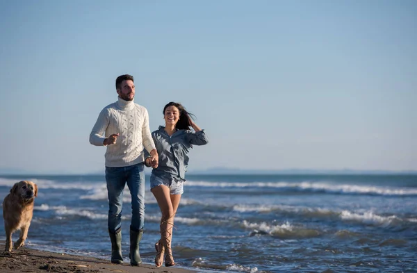 Couple Running Beach Holding Hands Dog Autmun Day — Stock Photo, Image