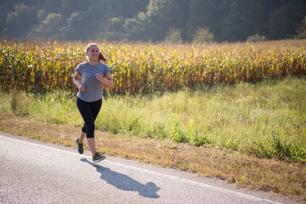 Young Woman Enjoying Healthy Lifestyle While Jogging Country Road — Stock Photo, Image