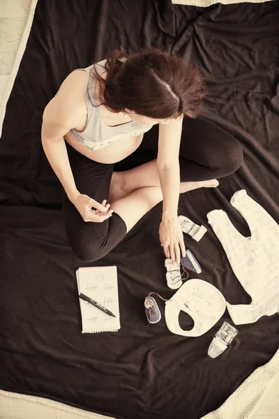 Pregnant Woman Home Floor Checking List Baby Clothes Preparing Going — Stock Photo, Image