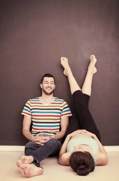 Happy Pregnant Couple Relaxing Front Black Chalkboard Floor Home — Stock Photo, Image