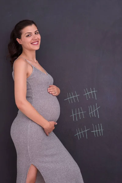 Portrait Happy Pregnant Woman Hands Belly Front Black Chalkboard — Stock Photo, Image