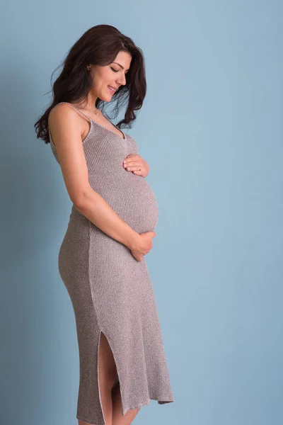 Portrait Happy Pregnant Woman Hands Belly Isolated Blue Background — Stock Photo, Image