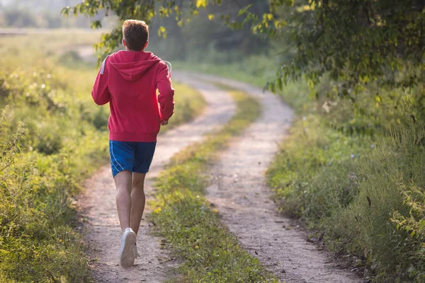Fiatalembert Élvezi Egészséges Életmód Miközben Jogging Country Road Testmozgás Fitness — Stock Fotó