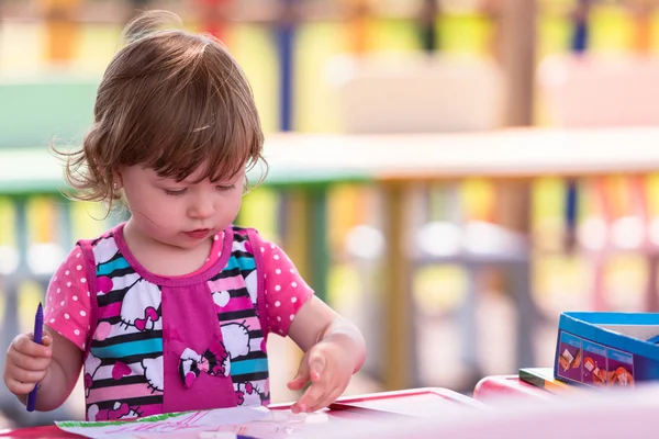 Cute Little Girl Cheerfully Spending Time Using Pencil Crayons While — Stock Photo, Image