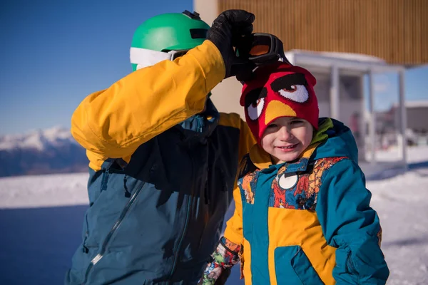 Young Happy Father Preparing His Little Son First Time Snowboard — Stock Photo, Image