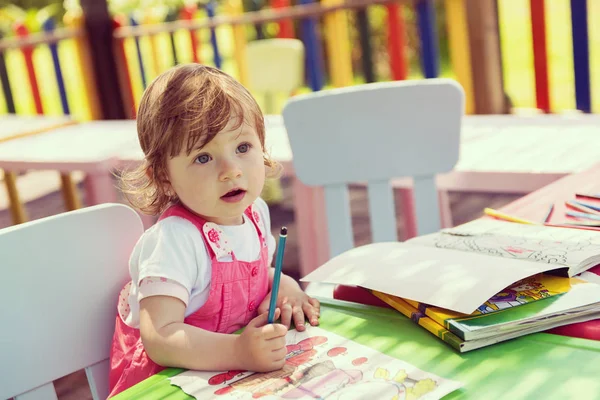 Cute Little Girl Cheerfully Spending Time Using Pencil Crayons While — Stock Photo, Image
