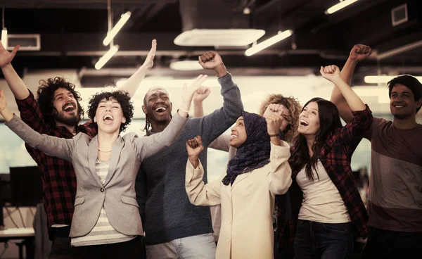 Portrait of young excited multiethnics business team — Stock Photo, Image