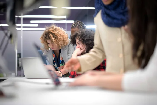 Multiethnics team of software developers working together — Stock Photo, Image