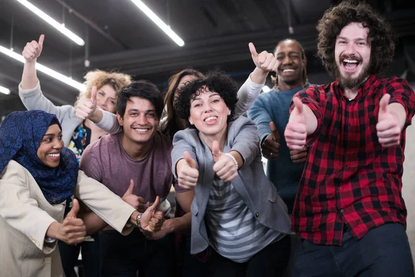 Portrait of young excited multiethnics business team — Stock Photo, Image