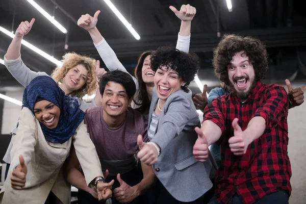 Portrait of young excited multiethnics business team — Stock Photo, Image