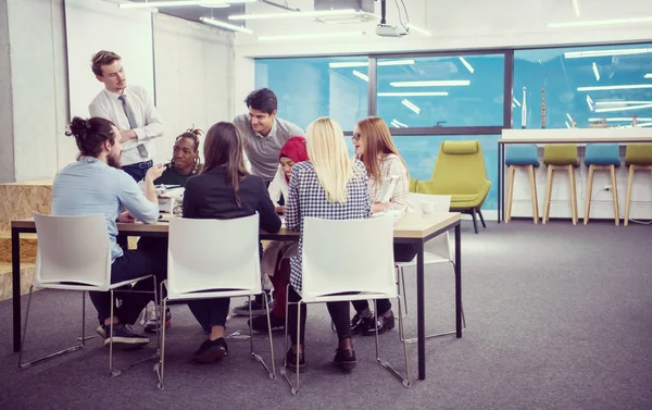 Multiethnic business team learning about drone technology — Stock Photo, Image