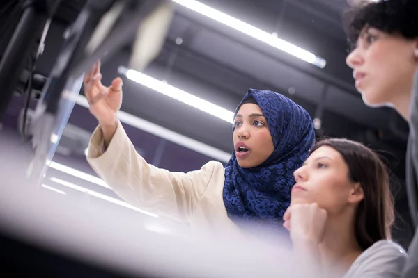 Multiethnics team of software developers working together — Stock Photo, Image