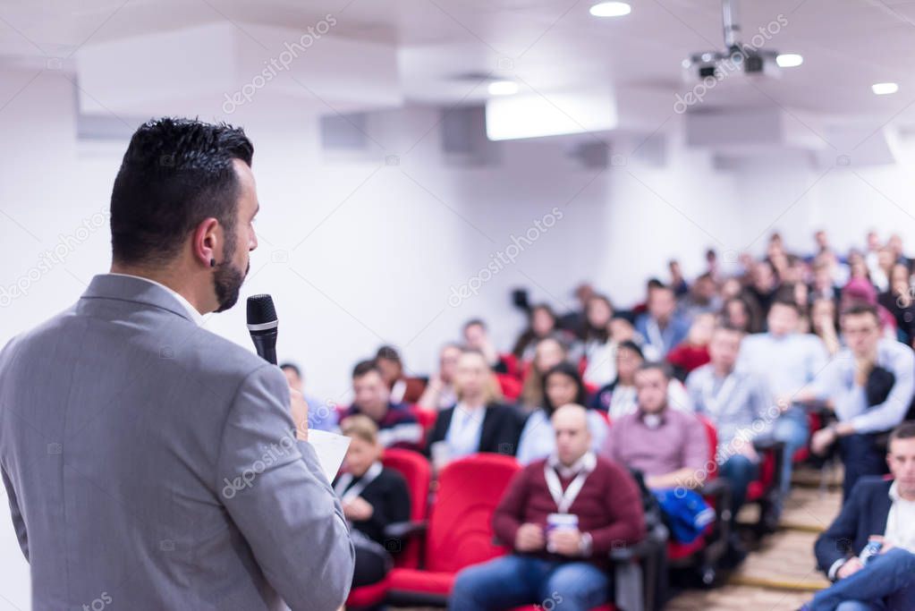 successful businessman giving presentations at conference room