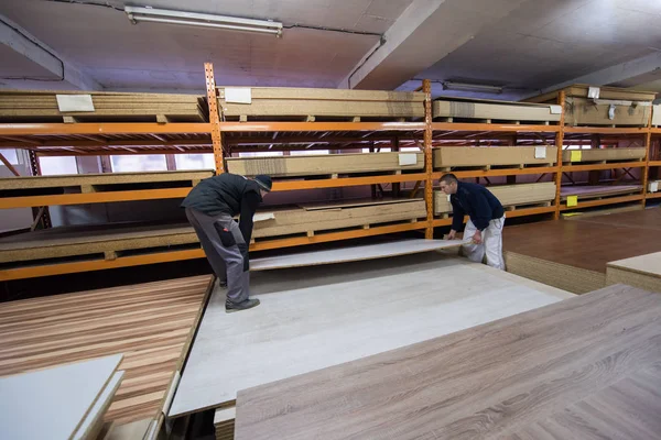 Two young carpenters working in big modern carpentry — Stock Photo, Image