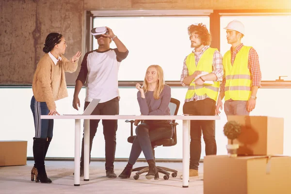 Group of multiethnic business people on construction site — Stock Photo, Image