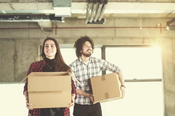 Business team carrying cardboard boxes — Stock Photo, Image