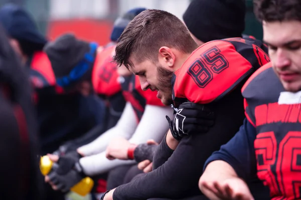 American football player holding the injured shoulder — ストック写真