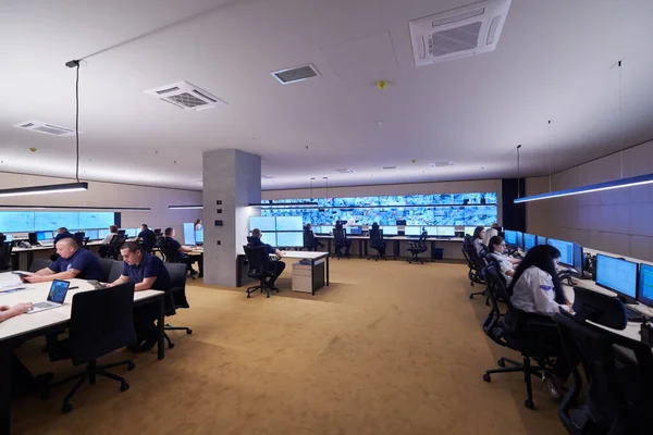 Group Security Data Center Operators Working Cctv Monitoring Room Looking — Stock Photo, Image