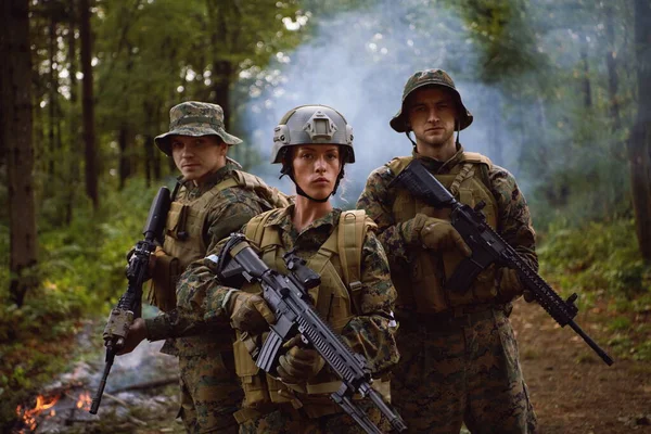 Modern Warfare Soldiers Squad Running in Tactical Battle Formation Woman as a Team Leader