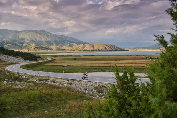 Triathlon Athlete Riding Professional Racing Bike Workout Curvy Country Road — Stock Photo, Image