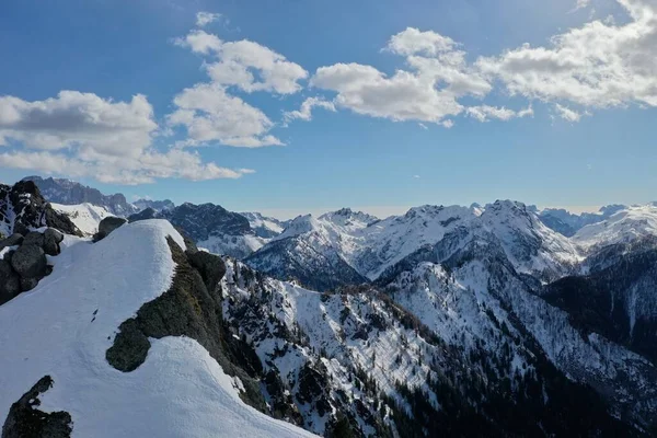 Aerial snow covered mountain peaks in alps at winter — Stock Photo, Image