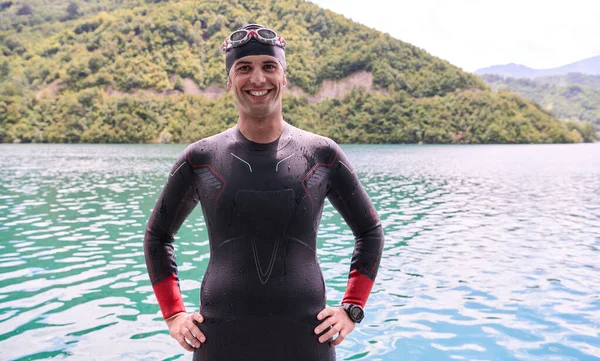 Triathlete swimmer portrait wearing wetsuit on training — Stock Photo, Image