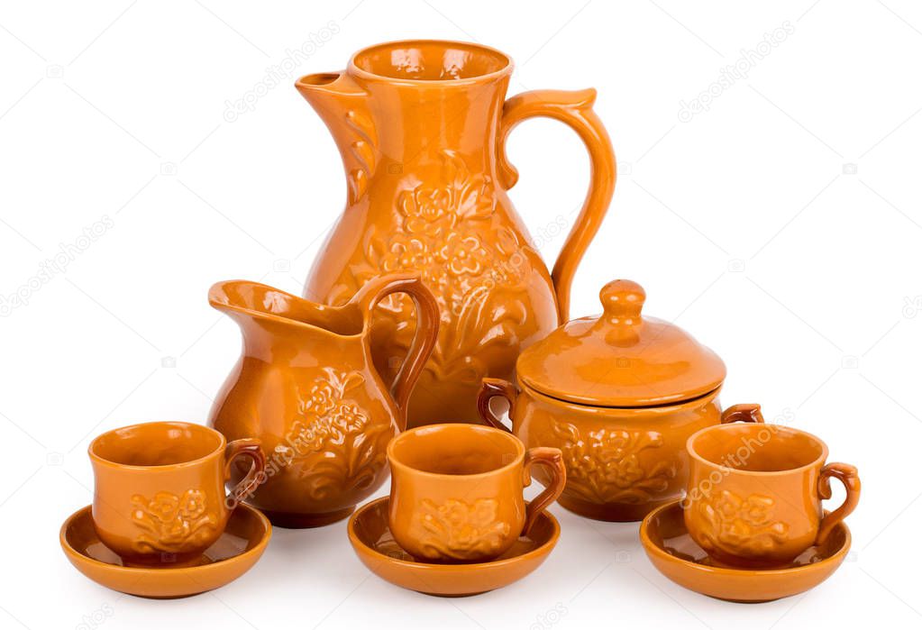 close up clay tea-set  and jug, isolated on white