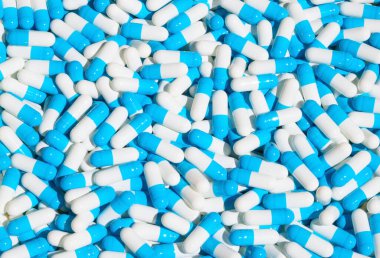 İlaçlı renkli kapsüllerin toplanması