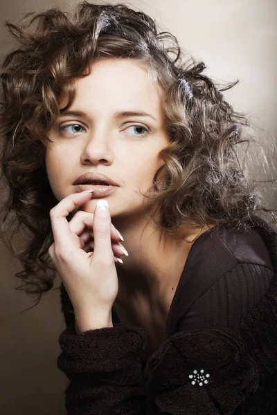 Image of beautiful young woman with curly hair — Stock Photo, Image