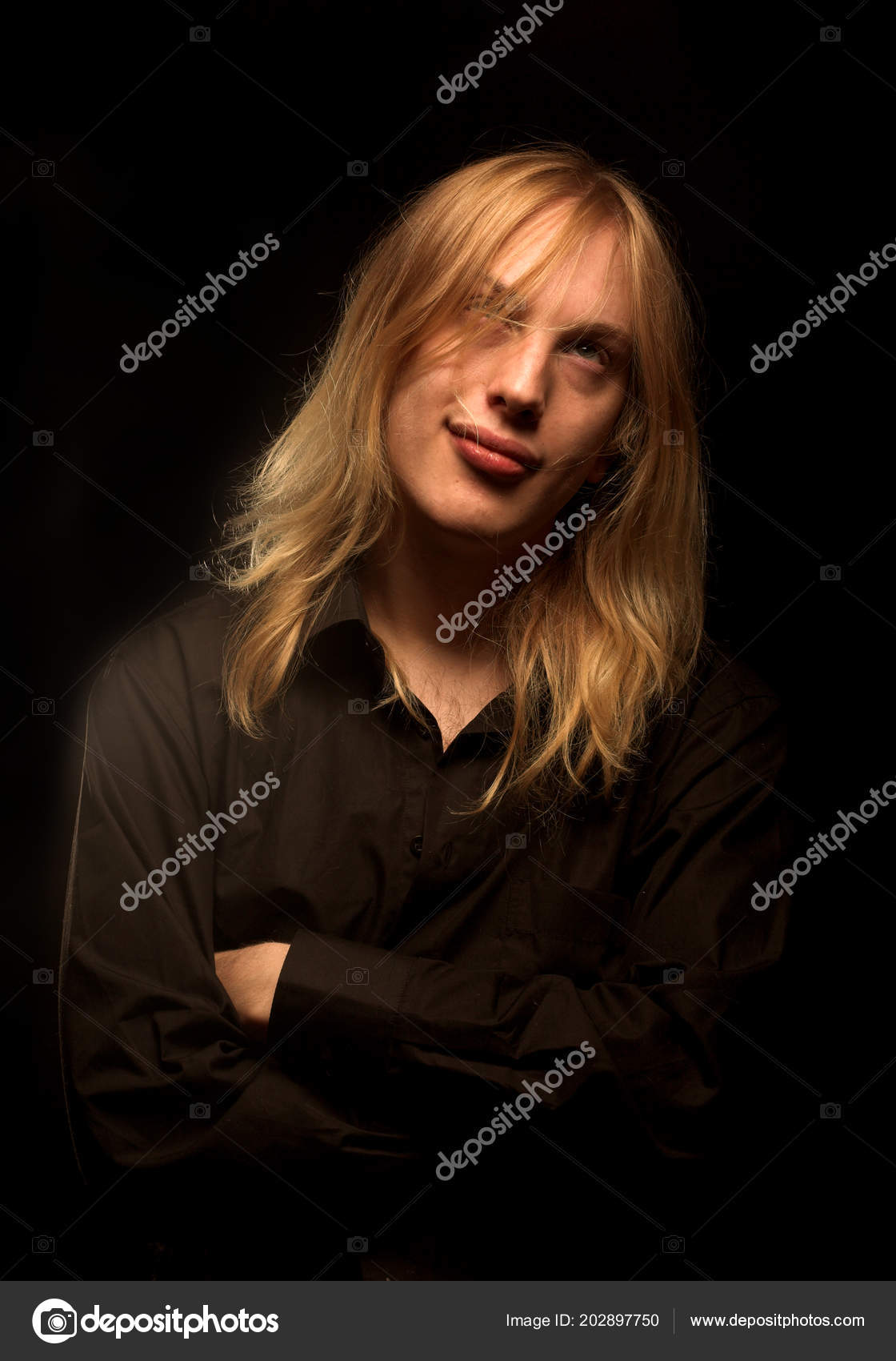 Young Man With Long Blond Hair Stock Photo C Kanareva 202897750